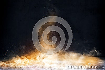 Room with concrete floor and smoke with fire sparks Stock Photo