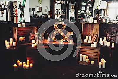 A room decorated with candles and lights Stock Photo