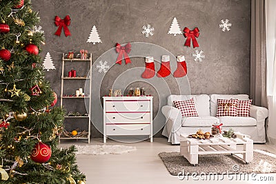 Room with decorated Christmas tree Stock Photo