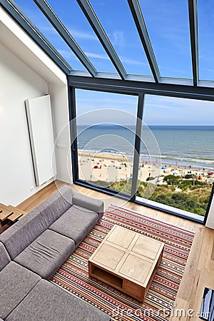 Room with large windows and view on seaside Stock Photo