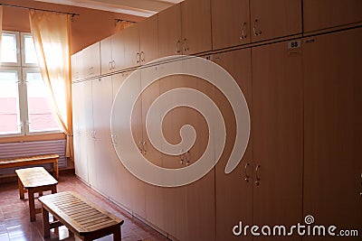 Room, locker room for workers with individual lockers for changing clothes in an industrial plant Stock Photo