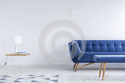 Room with navy blue couch Stock Photo