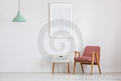 Room with old-fashioned pink chair Stock Photo