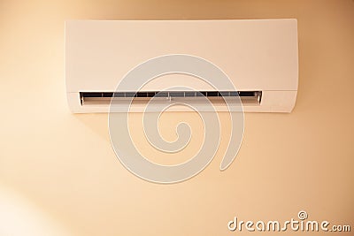 Room Wall Air Conditioner distribute conditioned air to improve thermal comfort and indoor air quality. Air conditioning is Stock Photo