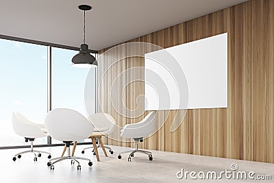 Room with wooden walls, large panoramic window a black ceiling lamp hanging above a coffee table Stock Photo