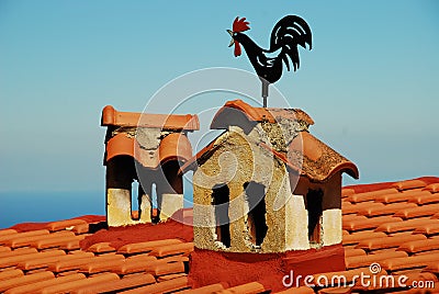 Rooster on the roof, Greece Stock Photo