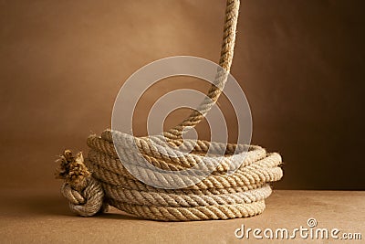 Hemp rope coiled and hanging Stock Photo