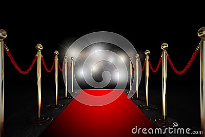 Rope barrier with red carpet and flash light Stock Photo