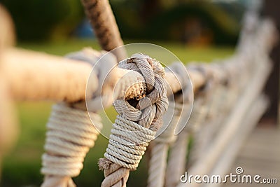 Rope bridge in the village garden Stock Photo