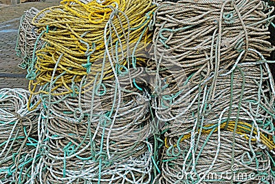 Rope coils on an English quayside Stock Photo