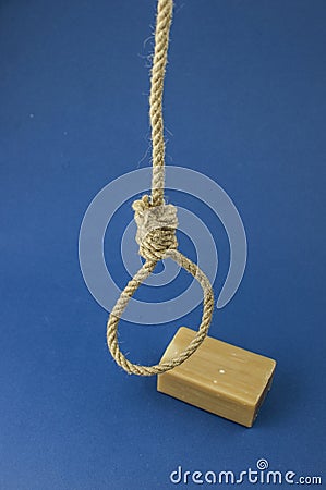 Gallows hanging rope knot tied noose and soap bar. Suicide concept Stock Photo