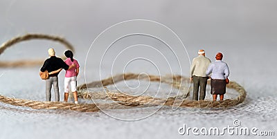 Rope and miniature people with business concept. Stock Photo