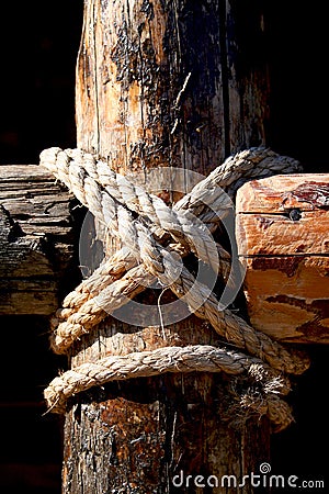 Rope, nail and wooden surface Stock Photo