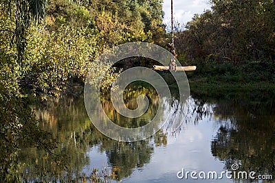 Rope swing at the Putah Creek in Davis, California, USA Stock Photo