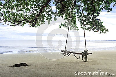 Rope swing on the wonderful beach. Sea scape view Stock Photo