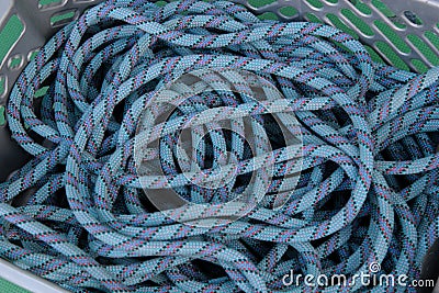 Ropes for climbing activities in vertical terrain, blue karmantel rope Stock Photo