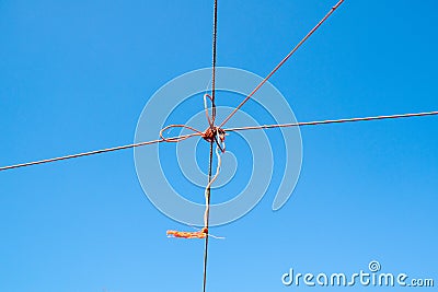 Ropes cross leash on blue sky outdoor Stock Photo