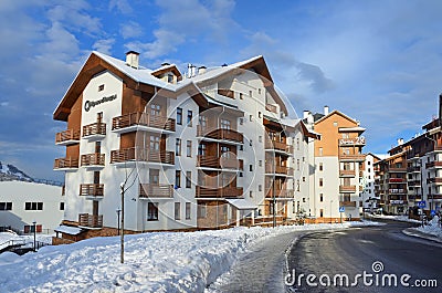 Rosa Khutor, Sochi, Russia, January, 26, 2018. Sulimovka street in Olympic village on Posa Khutor ski resort in winter. Hotel Priu Editorial Stock Photo