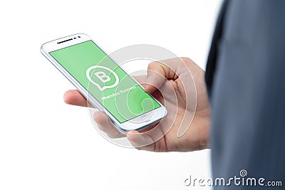 ROSARIO ARGENTINA - JANUARY 30 2021: WhatsApp business application on the screen of a smartphone. Editorial Stock Photo