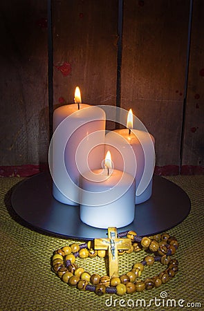 Rosary and Candles Stock Photo