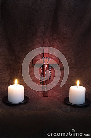 Rosary, Crucifix and Two Candles Stock Photo
