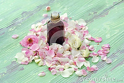 Rose essential oil and flowers petals for Spa treatments Stock Photo
