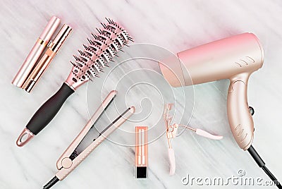 Rose gold hair care and beauty products Stock Photo