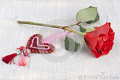 Rose and a handmade heart Stock Photo