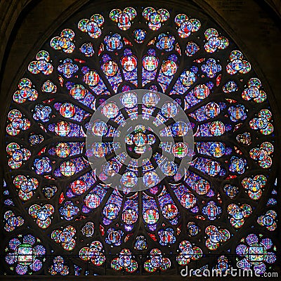 Rose stained glass window in the cathedral of Notre Dame de Paris Editorial Stock Photo