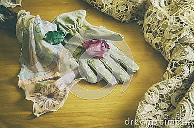 Rose and a veil on a glove Stock Photo