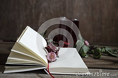 Roselle drink on Wood desk with a books note and repice Stock Photo
