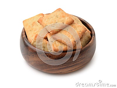 Rosemary crackers in wooden bowl Stock Photo