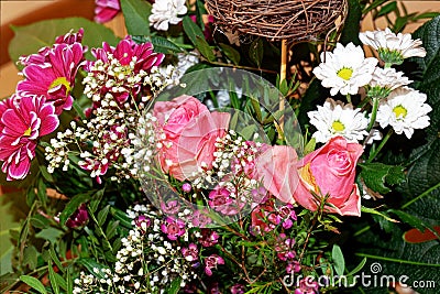 Roses, baby's breath and motherwort Stock Photo