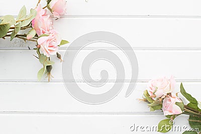 Roses on the background of white boards Stock Photo