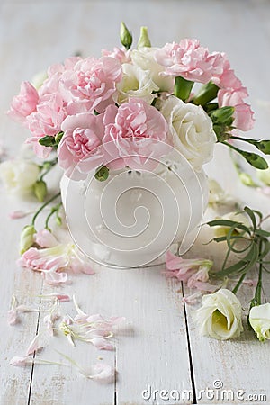 Roses and carnation in vase Stock Photo