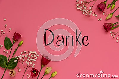 Roses Flower Arrangement, German Text Danke Means Thank You, Flat Lay Stock Photo