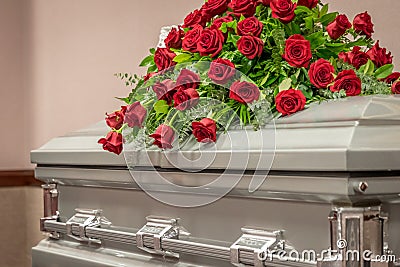 Roses on Top of Funeral Casket Stock Photo