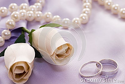 Roses and wedding rings Stock Photo