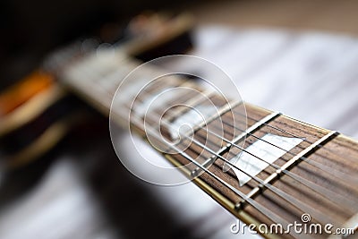 Rosewood neck six string guitar long perspective Stock Photo