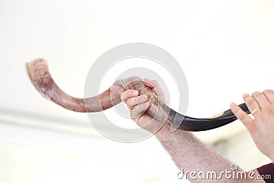 Blowing Shofar, Rosh hasanah Jewish New year Deer horn Shana Tova Stock Photo