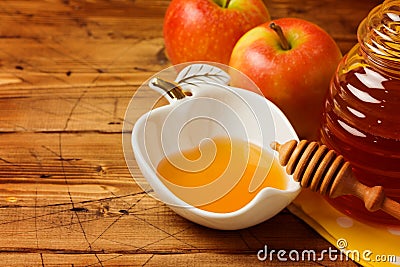 Rosh hashanah Jewish new year holiday celebration concept. Honey and apples Stock Photo