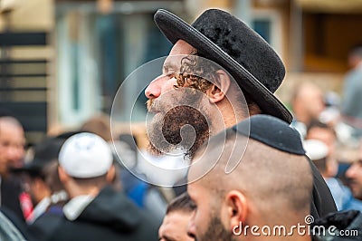 Rosh Hashanah, Jewish New Year 5777. Pilgrims of Hasidim in traditional festive attire celebrate mass in sity the Uman. Editorial Stock Photo