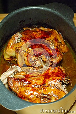 Rosted Chicken. appetizing roast turkey and potatoes in the oven Stock Photo