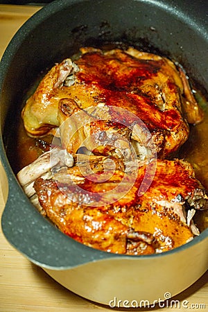 Rosted Chicken. appetizing roast turkey and potatoes in the oven Stock Photo