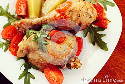 Rosted chicken with tomatoes, toned Stock Photo