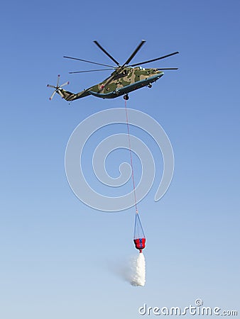 ROSTOV-ON-DON, RUSSIA - JULY 01: Mi-26T heavy transport helicopter, fire extinguishing Editorial Stock Photo