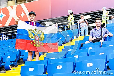 ROSTOV-ON-DON, RUSSIA - 20 June, 2018 Match day at FIFA World Cup Russia 2018 Host City Rostov-on-Don. Russian Fans waving flag at Editorial Stock Photo