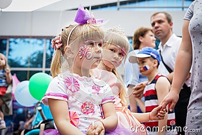 ROSTOV-ON-DON, RUSSIA - 20 May, 2018. Festival Ball of Babies. A beautiful little girl and in a festive dress and carnival mask Editorial Stock Photo