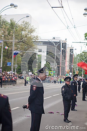 Rostov-na-Donu, RUSSIA - May 9,2017: Immortal Regiment procession in Victory Day Immortal regiment policemen guard order at the pa Editorial Stock Photo