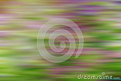 Rosy and beige stains in a green fond blurred in horizontal direction Stock Photo